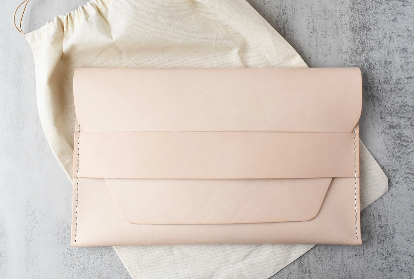 Tan leather clutch