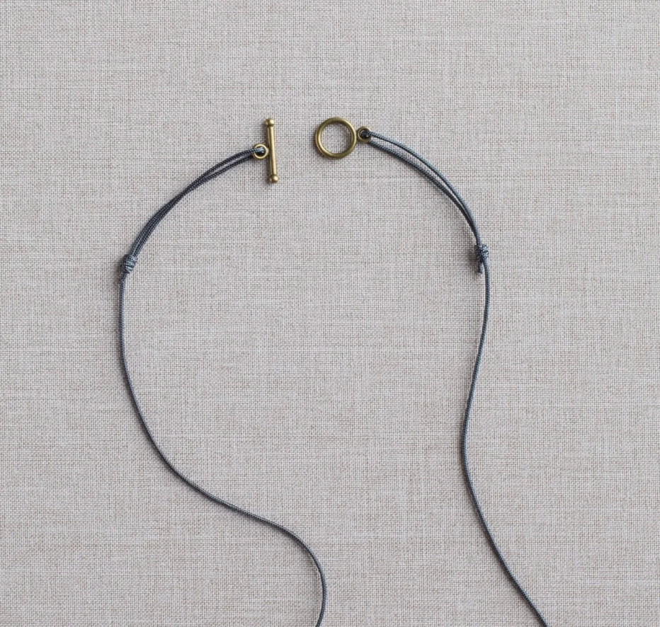 Liz Quan short necklace 'SFL'